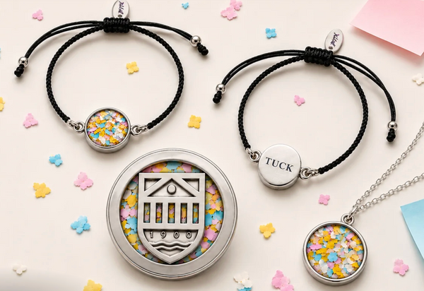 A finished lapel pin, Taylor bracelet, and Amy necklace.
