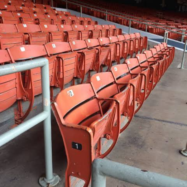 Wooden seats at RFK stadium that Rebel Nell transformed into custom corporate gifts.